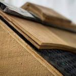 An up-close shot of Cedar Breather® & Rapid Ridge 7 installed on a roof with wooden shingles