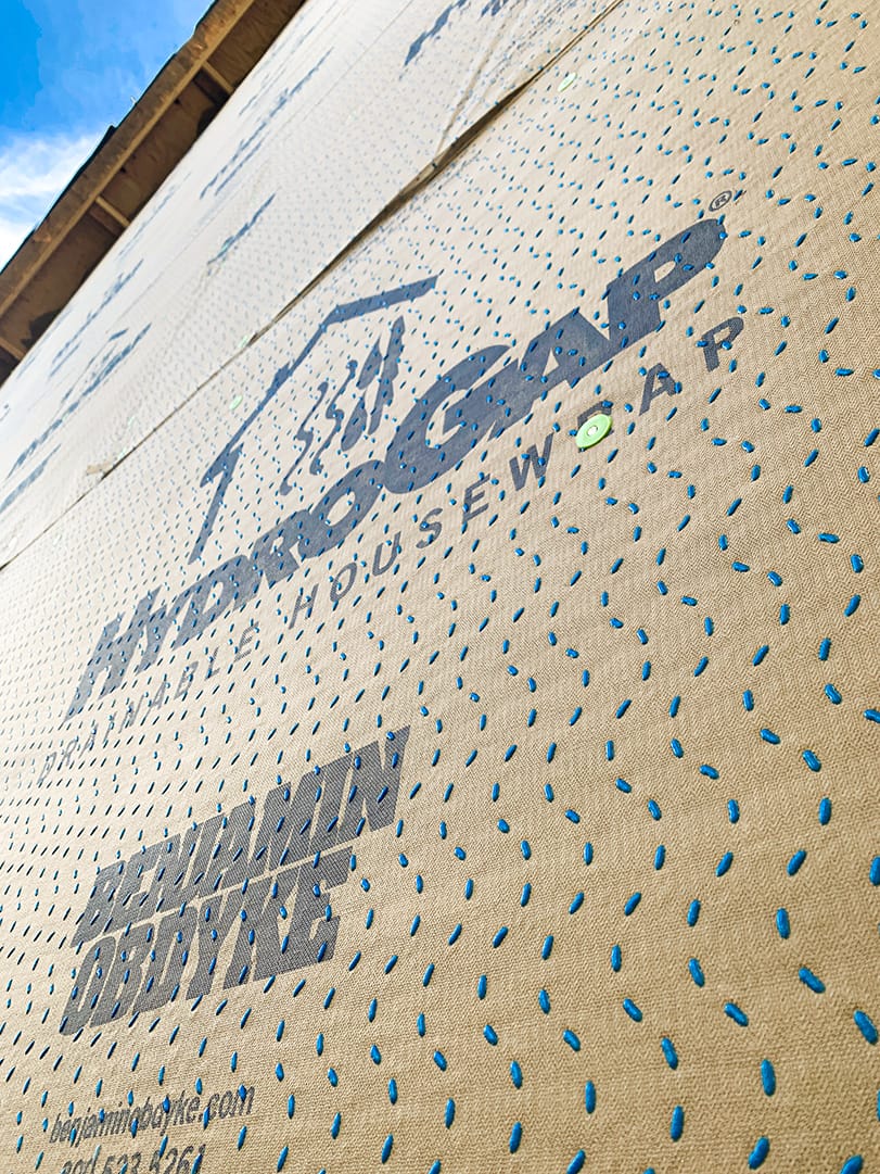 HydroGap drainable housewrap with cap fasteners.