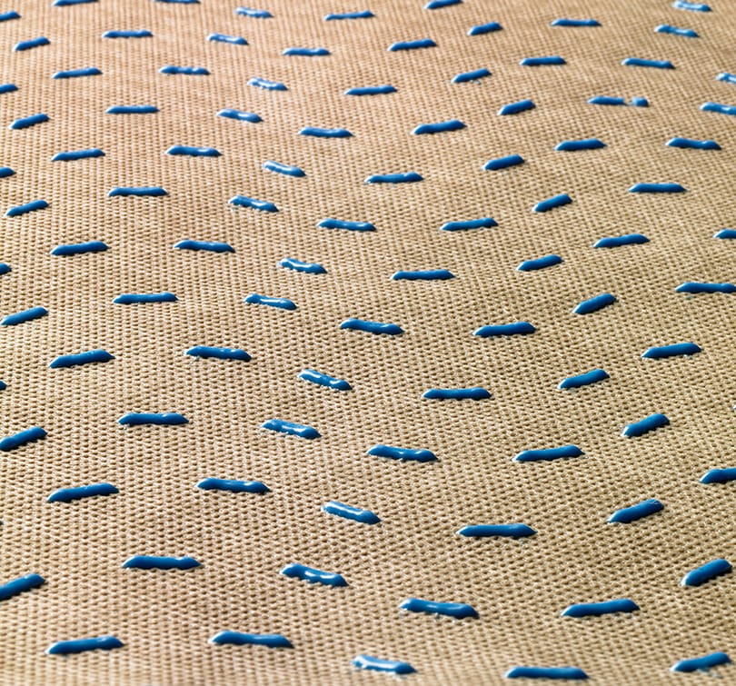 Up close shot of the 1-millimeter spacers on HydroGap Drainable Housewrap