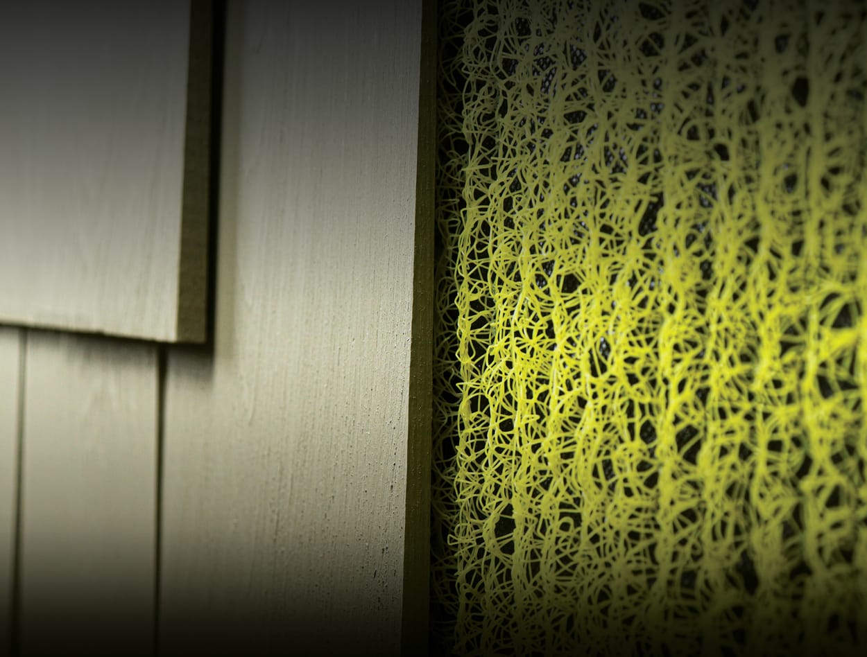 An up-close shot of Slicker® HP Rainscreen installed on the side of a home