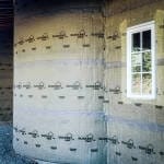 A rounded corner of a home with Slicker® MAX installed