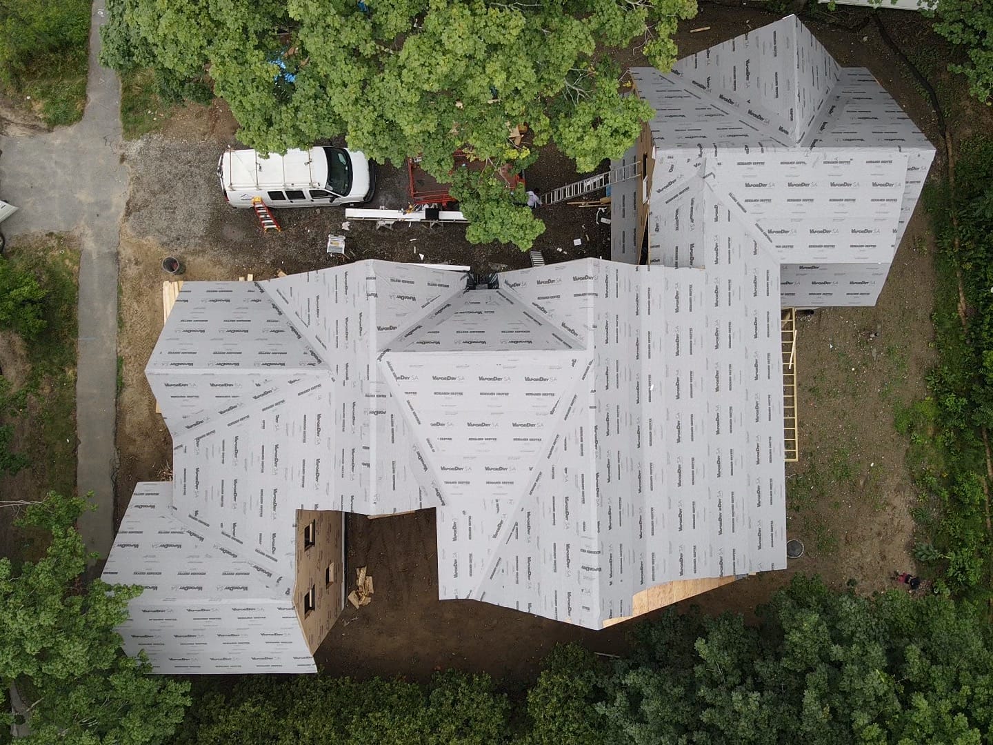 Aerial view of a full-roof installation of VaporDry SA roof underlayment.